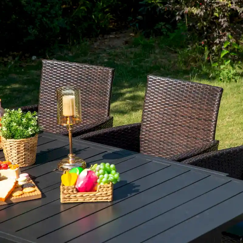 Multi-piece Expandable Black Steel and Rattan Outdoor Dining Table Set