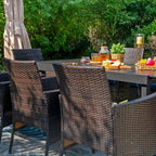 Multi-piece Expandable Black Steel and Rattan Outdoor Dining Table Set